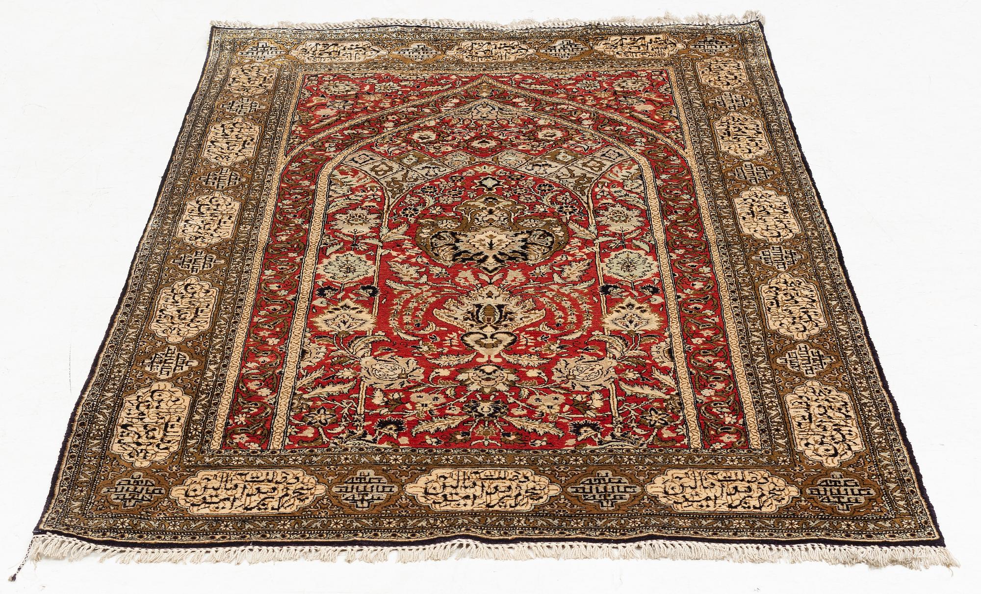 A rug, silk Quum, ca 174 x 103 cm.