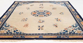 A carpet, China, Antique finish, ca 362 x 275 cm.