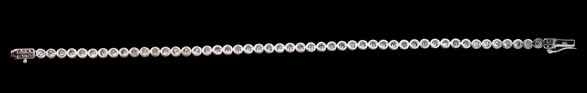 ARMBAND, sk Rivière, 18 k vitguld, briljantslipade diamanter tot ca 3.00 ct. Vikt ca 9,0 g.