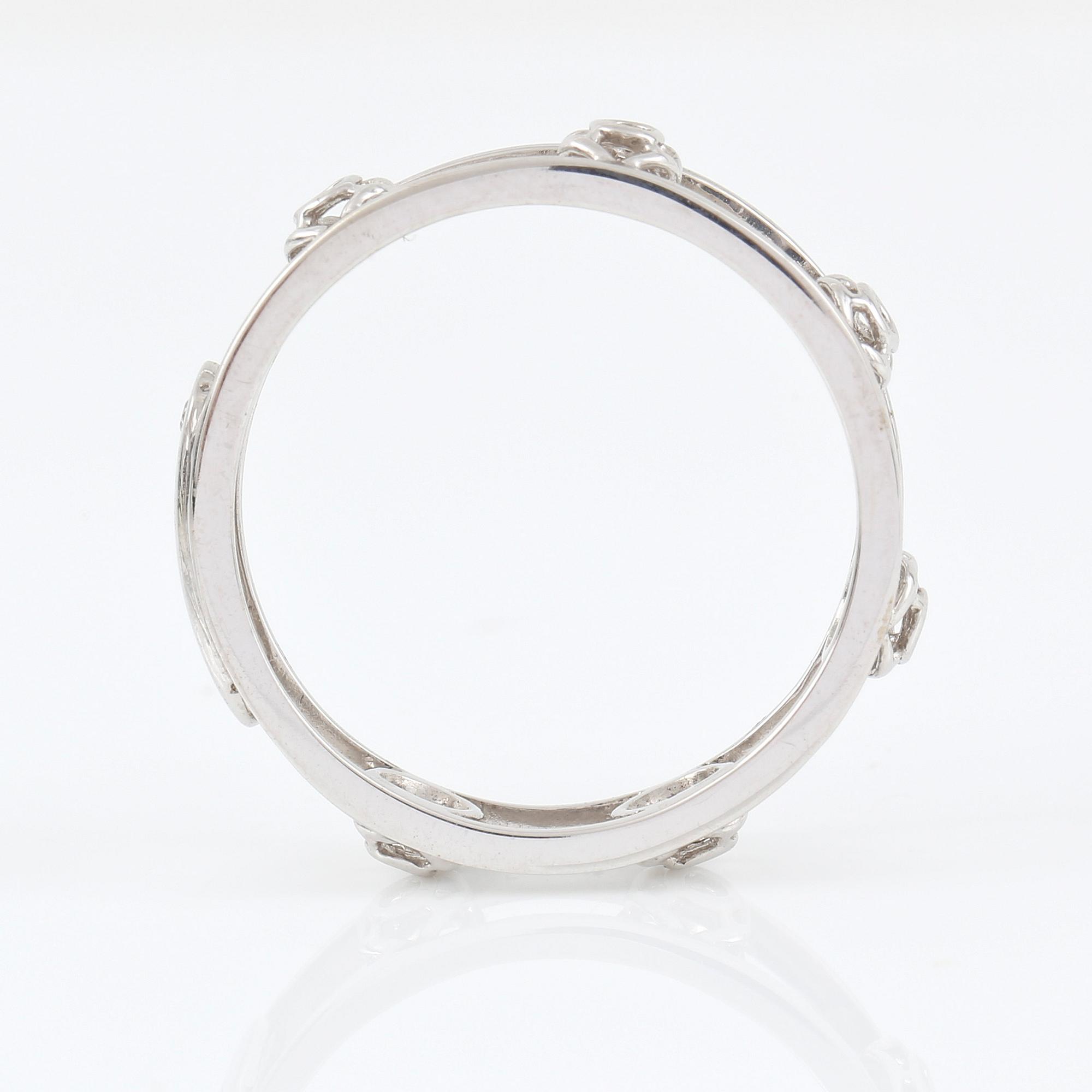 RING, Bliss, Italien. genombruten 18K vitguld med diamant på logoplatta 0.007ct.
