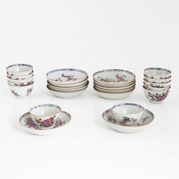 Twelve Chinese famille rose cups on stands, Qing dynasty, Qianlong (1736-95).