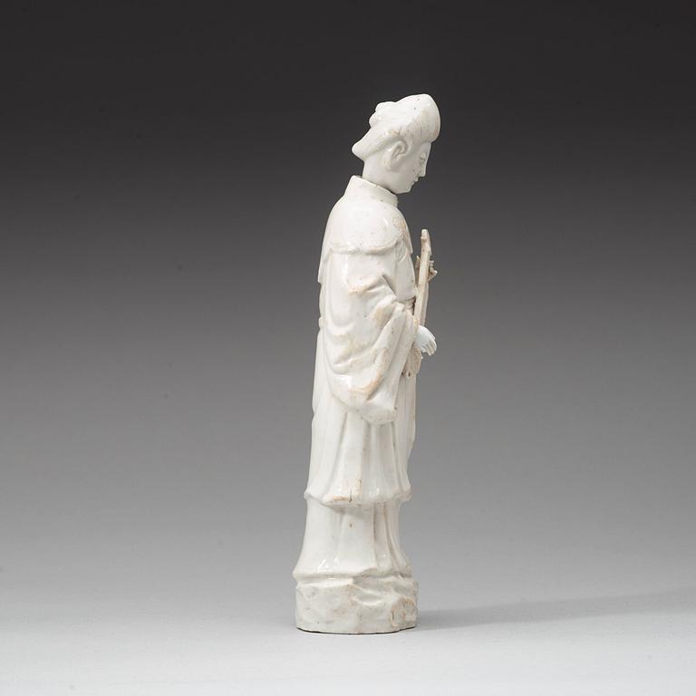 A blanc de chine figure of a court attendant, Qing dynasty, Kangxi ca 1690.