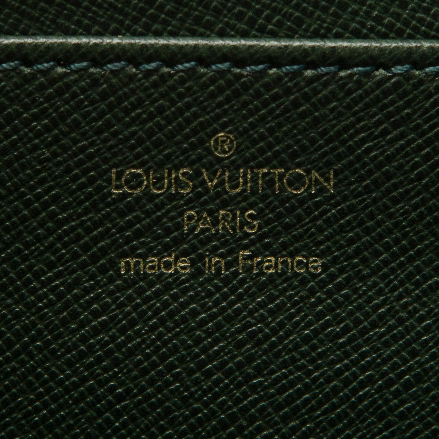 A Green Taiga Leather Serviette Laguito Briefcase.