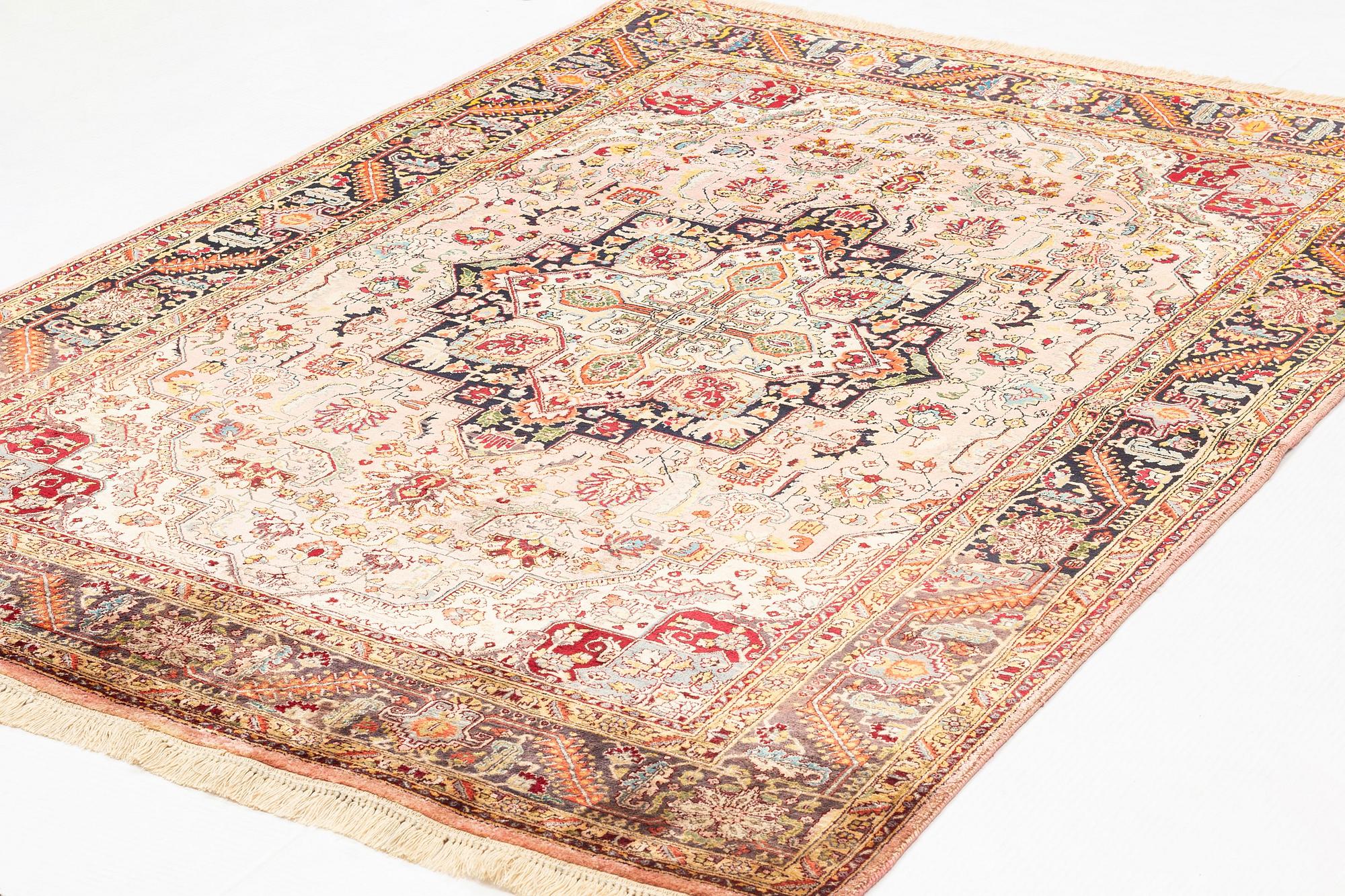 A rug, old, silk Tabriz, signed, ca 201 x 140 cm.