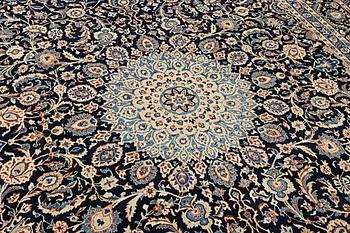 A Keshan carpet, c. 392 x 290 cm.