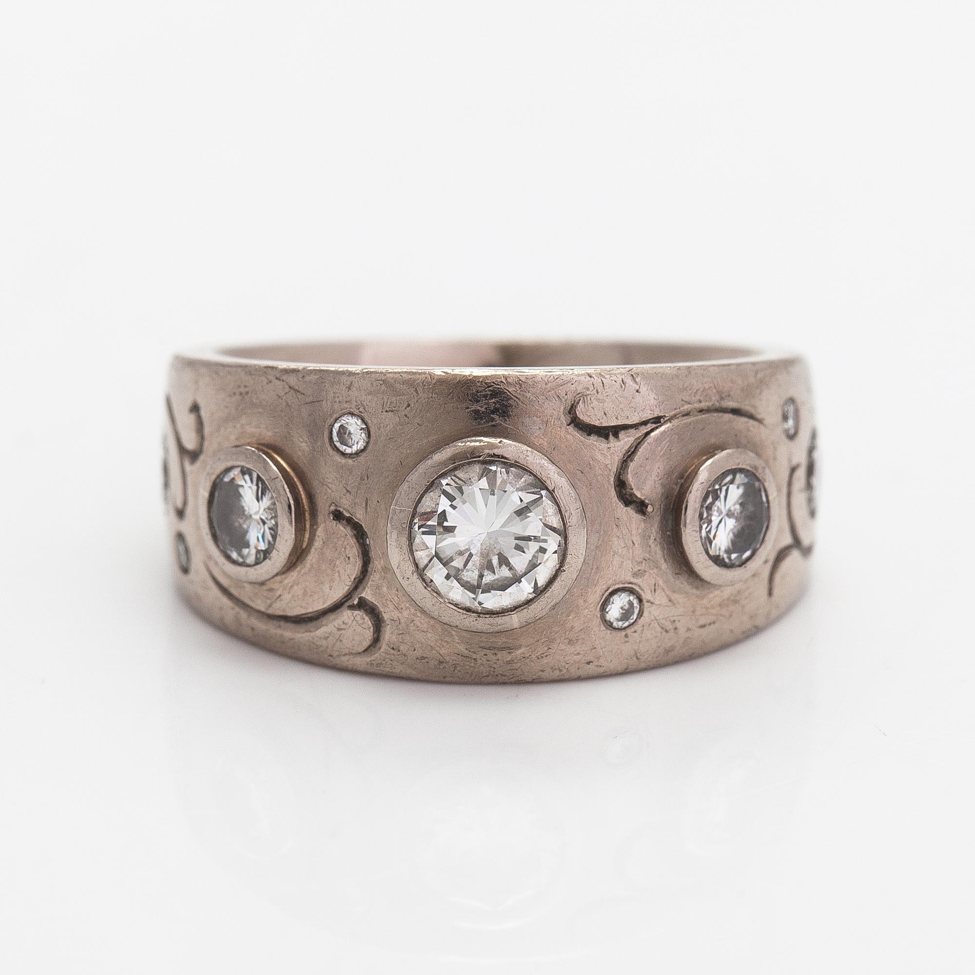 An 18K white gold ring with diamonds ca. 1.00 ct in total. Tarkkanen Oy, Helsinki 2012.