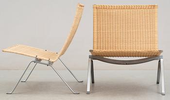 A pair of Poul Kjaerholm 'PK-22' steel and ratten easy chairs, Fritz Hansen, Denmark 1989.