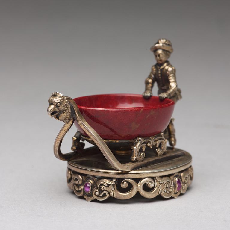 A Fabergé purpurin and silver salt-cellar, workmaster Erik Kollin, St. Petersburg before 1896. Scratched inventory no.