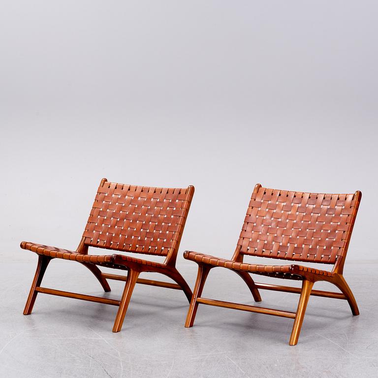 A pair of 'Porto' teak easychairs by Newport.