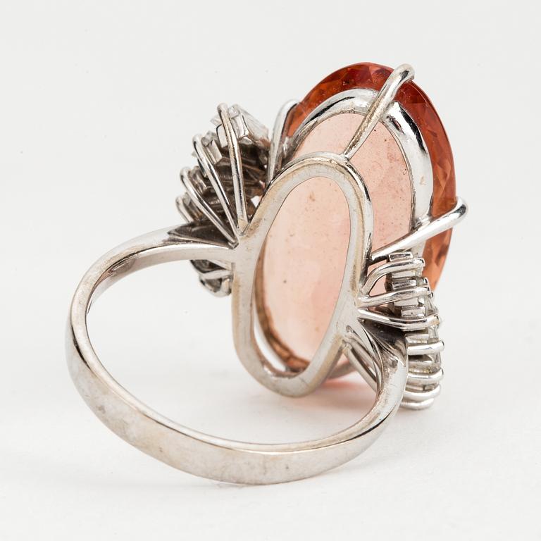 A topaz and diamond cocktail ring.