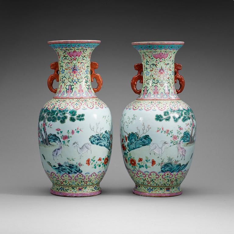 A pair of famille rose vases, Qing dynasty with Qianlong seal mark.