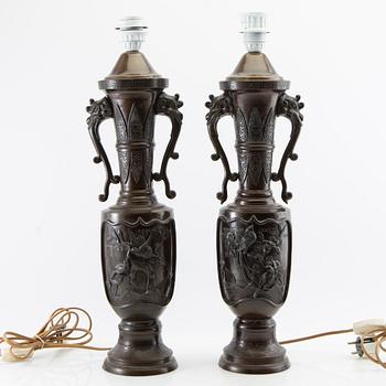 Table lamps a pair China 20th century patinated metal.