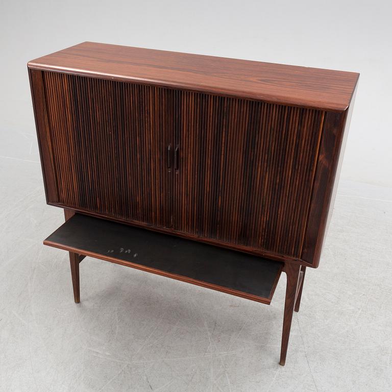 KURT ØSTERVIG, a Danish rosewood veneered drinks cabinet, 1960's.