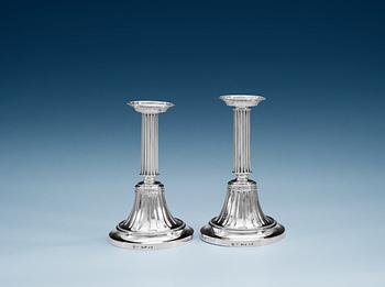 A pair of Swedish 19th century silver candlesticks, makers mark of Nils Tornberg, Linköping 1812.