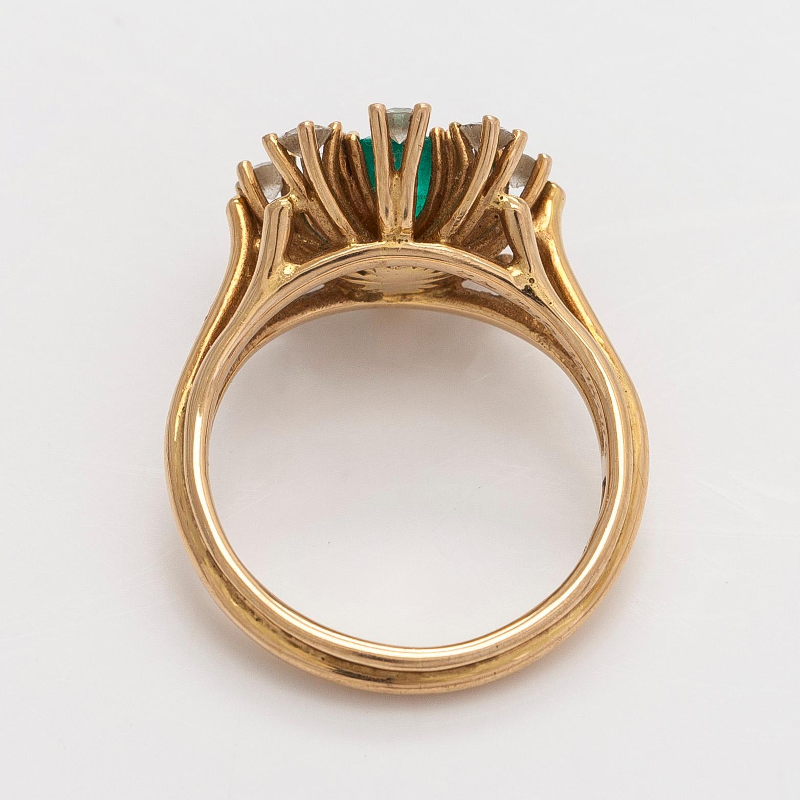 Ring, faceted emerald, brilliant cut diamonds, 18K gold, Stockholm 1982.