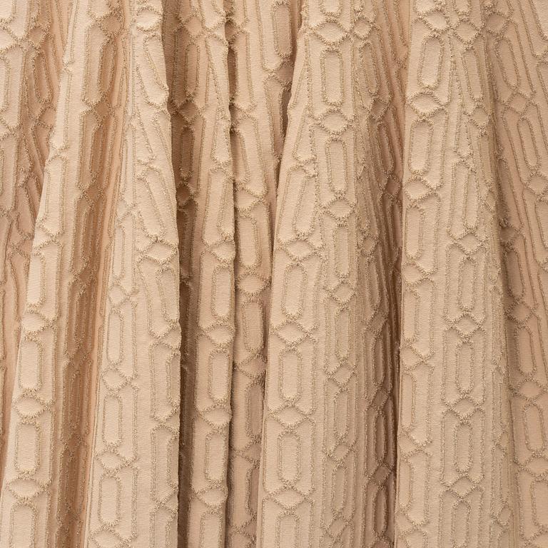 Alaïa, a beige patterned dress, size 36.