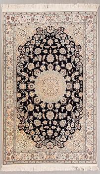 A Nain part silk carpet ca 212x133 cm.