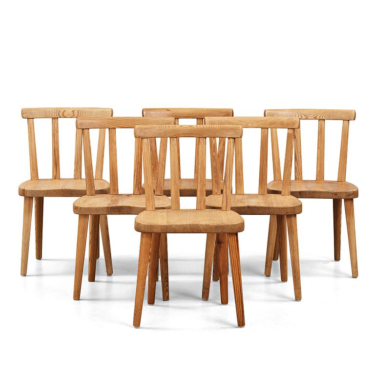 Axel Einar Hjorth, a set of six "Utö" stained pine chairs, Nordiska Kompaniet, Sweden 1930's.