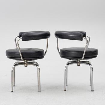 Charlotte Perriand, /Le Corbusier, swivel armchairs, a pair, model LC7, Cassina, Italy, later part of the 20th century.