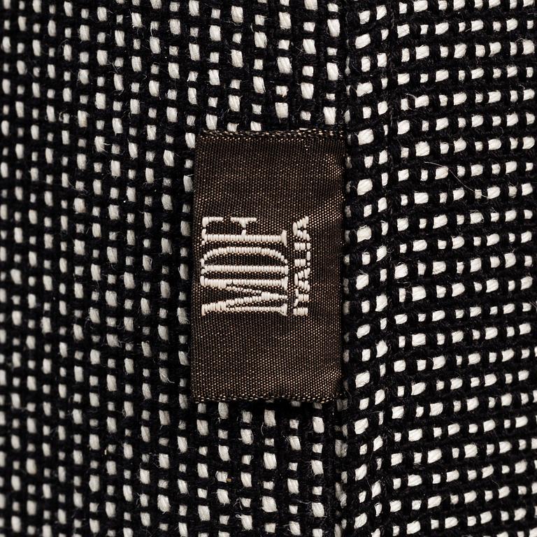 BRUNO FATTORINI, an 'Edgar' sofa from MDF Italia.