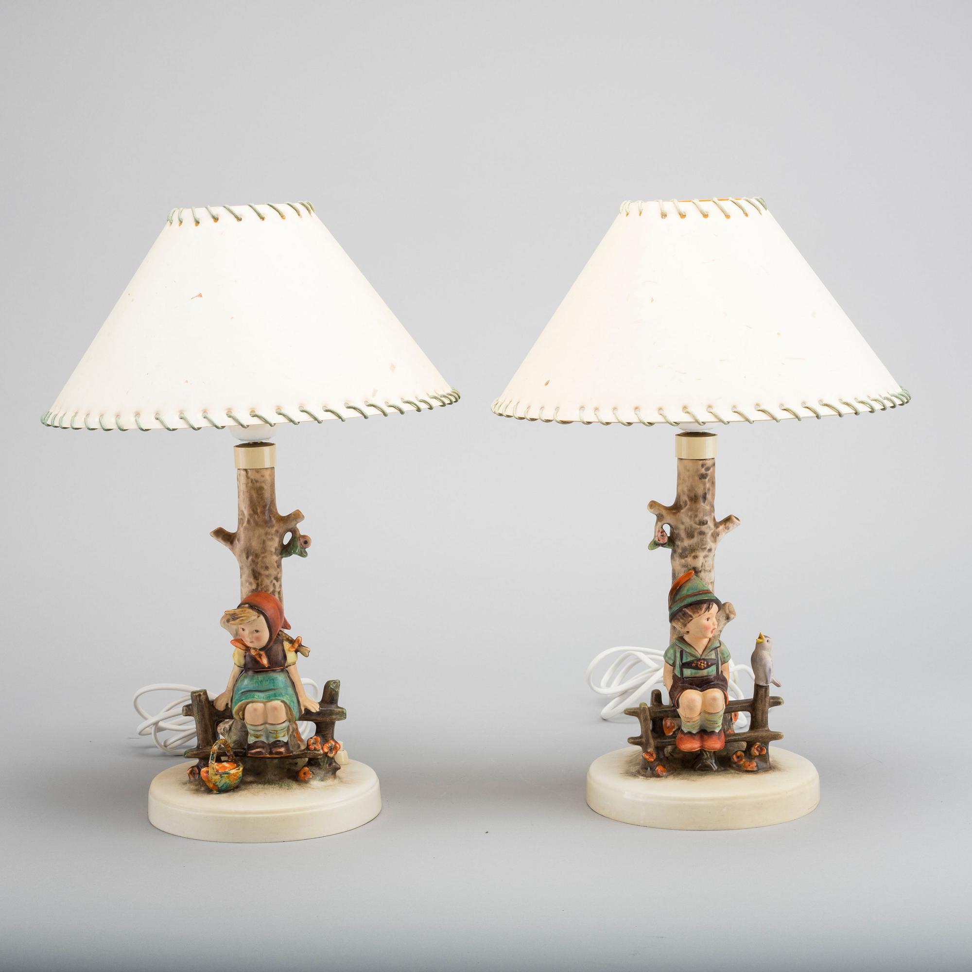 MARIA INNOCENTIA HUMMEL, a pair of porcelain lamps.
