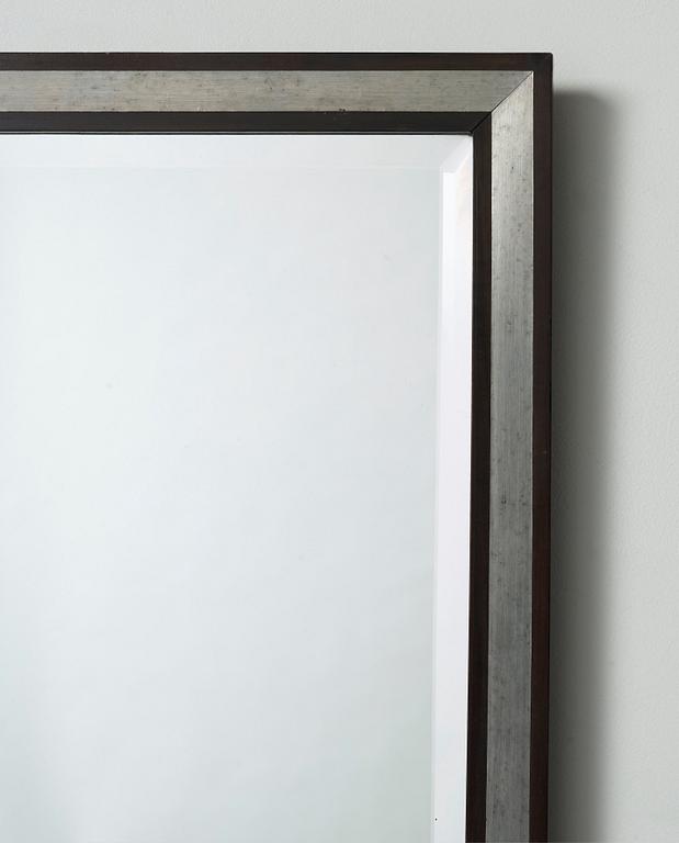 An Uno Åhrén pewter and black lacquered wood wall mirror, Svenskt Tenn, Sweden circa 1930.