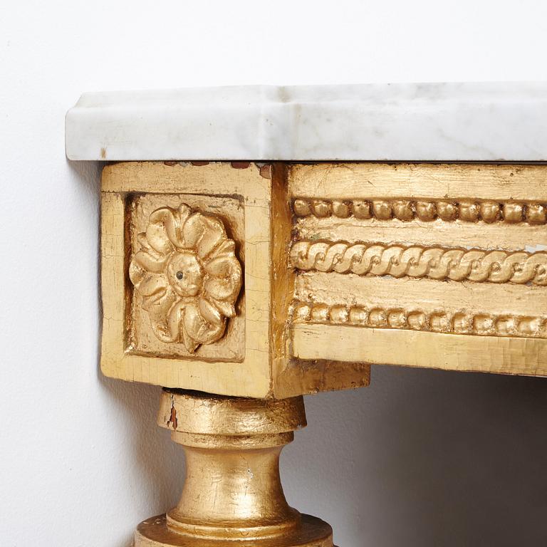 A pair of Gustavian late 18th century corner console tables.