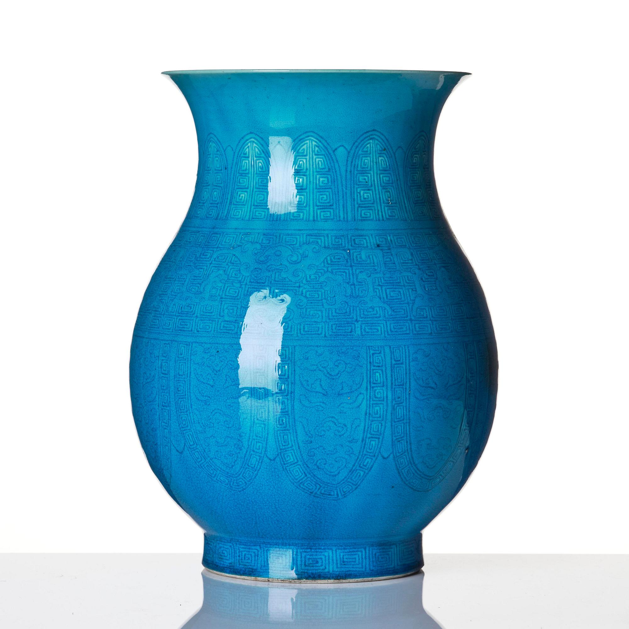 A turquoise glazed vase, zun, Qing dynasty with a Qianlong incised seal mark and of the period.