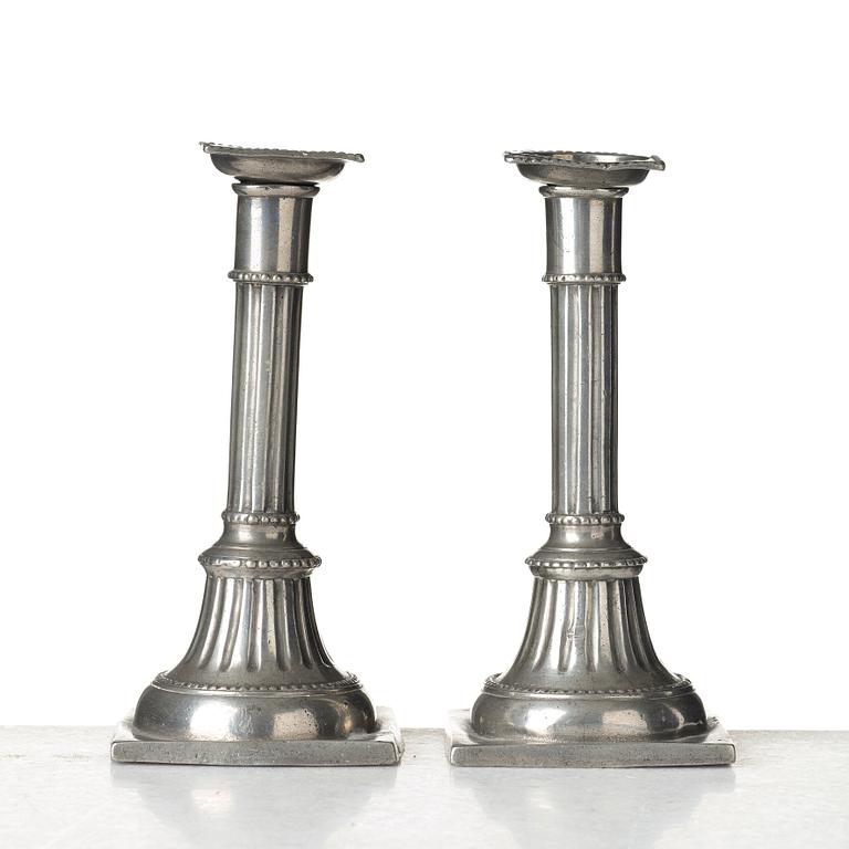 A pair of late Gustavian pewter candelsticks by Daniel Rising, Åbo 1797.