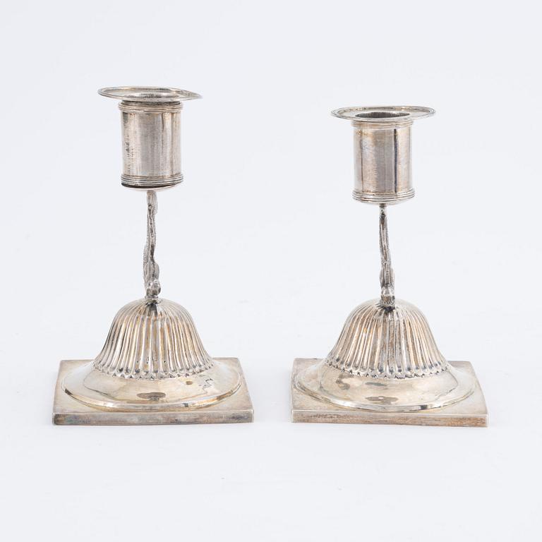 A pair of silver candle sticks by CM Ryberg Stockholm, 1815.