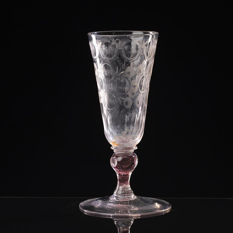 A Bohemian cut and engraved colour twist goblet, first half of the 18th Century.