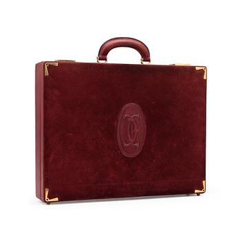 595. CARTIER, a red leather briefcase.