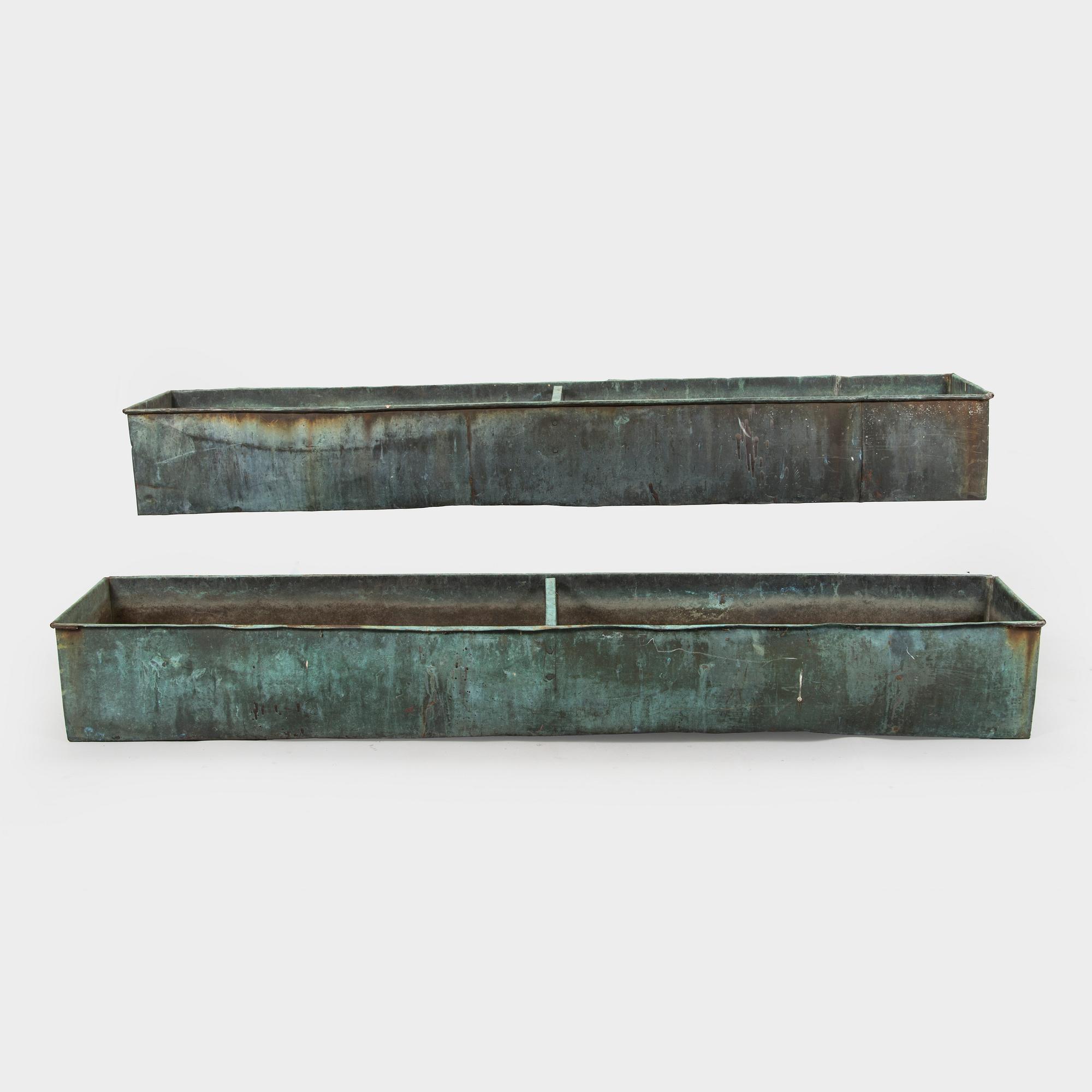 Two mid-20th century planters.