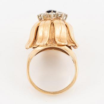 Ring, Hans Scherlund, 18K gold with white and blue stones.
