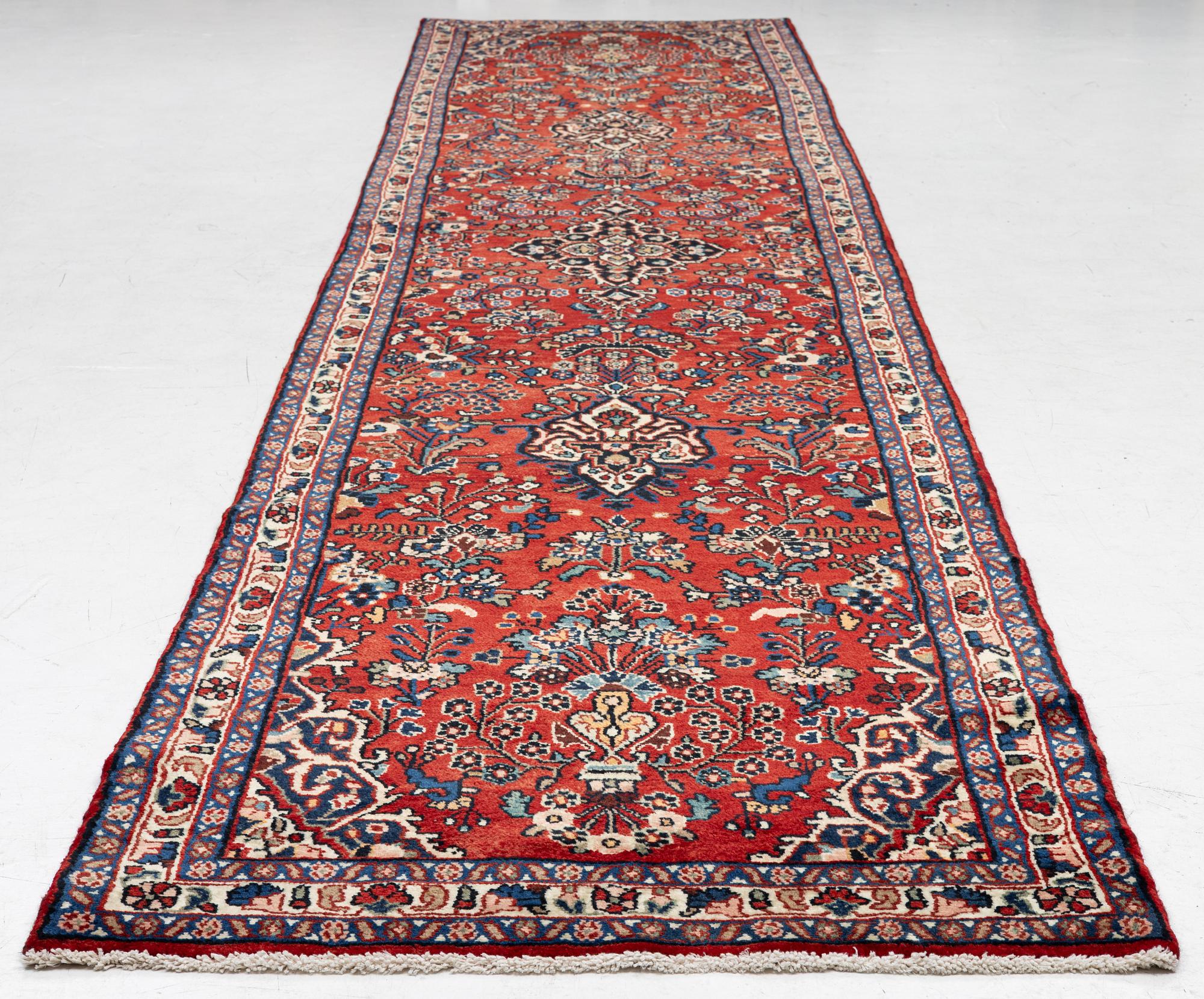 A Mehraban runner, c. 515 x 110 cm.