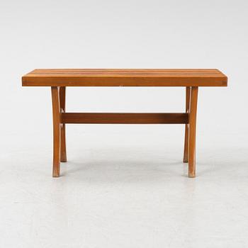 A stained-wood bench, later part of the 20th Century.