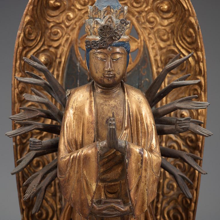 A Japanese wooden sculpture of Bodhisattva Kannon Senju, Edo period, 18th Century.