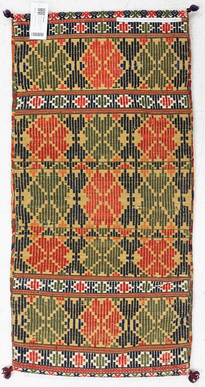 A double-interlocked tapestry carrige cushion, c 100 x 50 cm, Scania, mid 19th century.