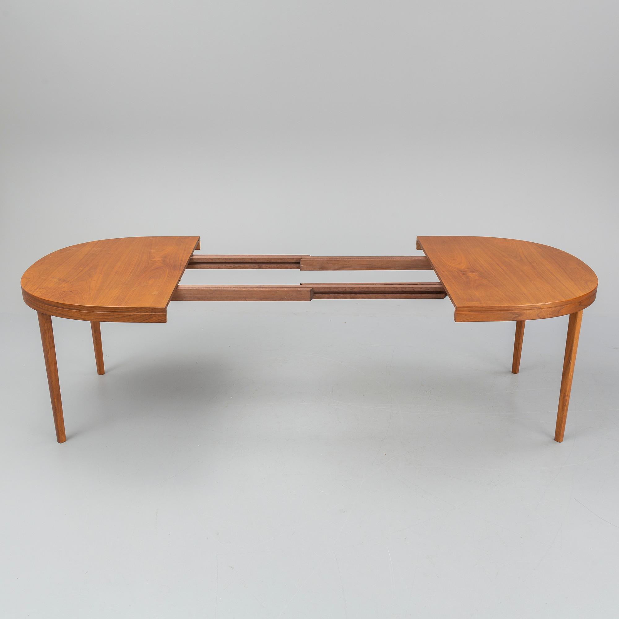 A walnut veneer table from the second half of the 20th century.