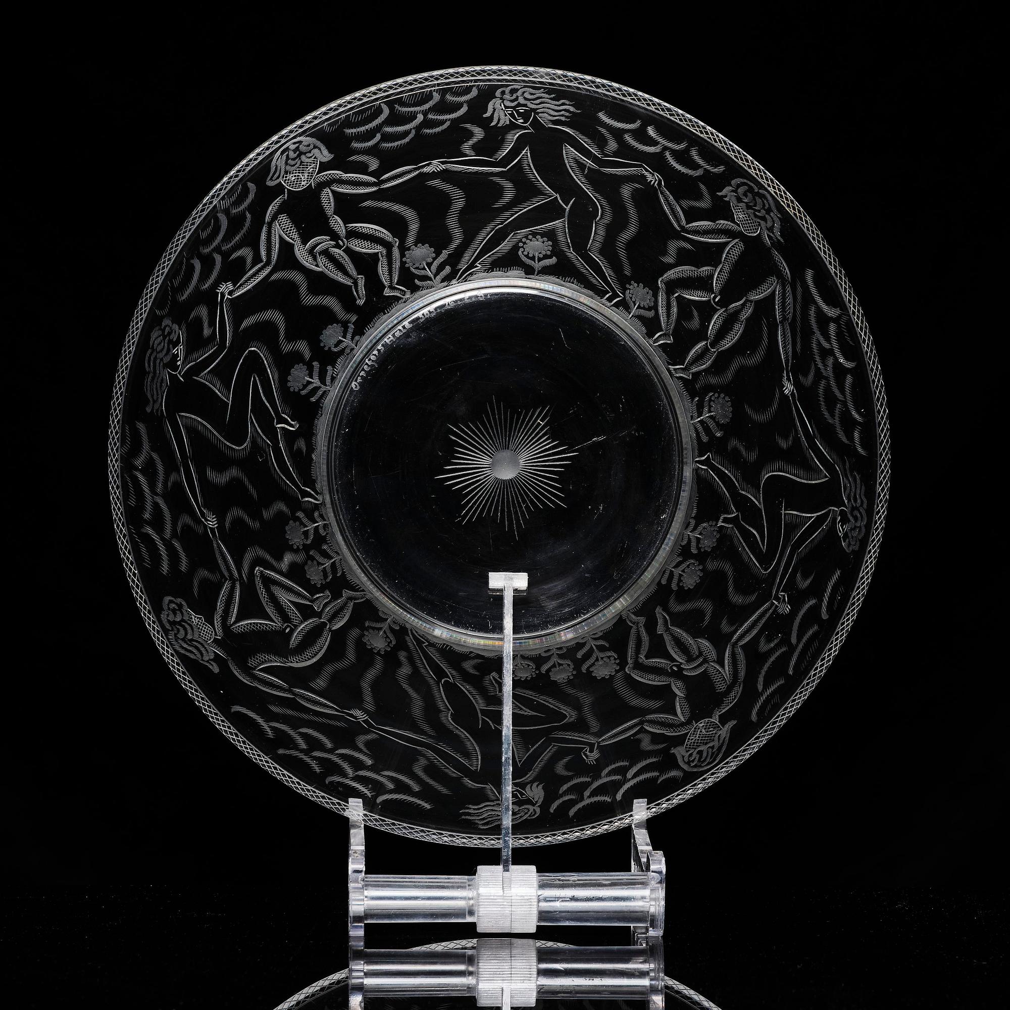 Edward Hald, an engraved glass bowl with plate, Orrefors, Sweden, 1926, model 305, engraved by Emil Goldmann.