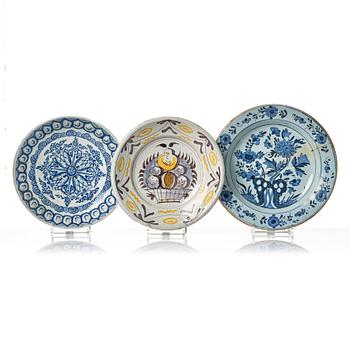 A group of three faience dishes, 18th century.