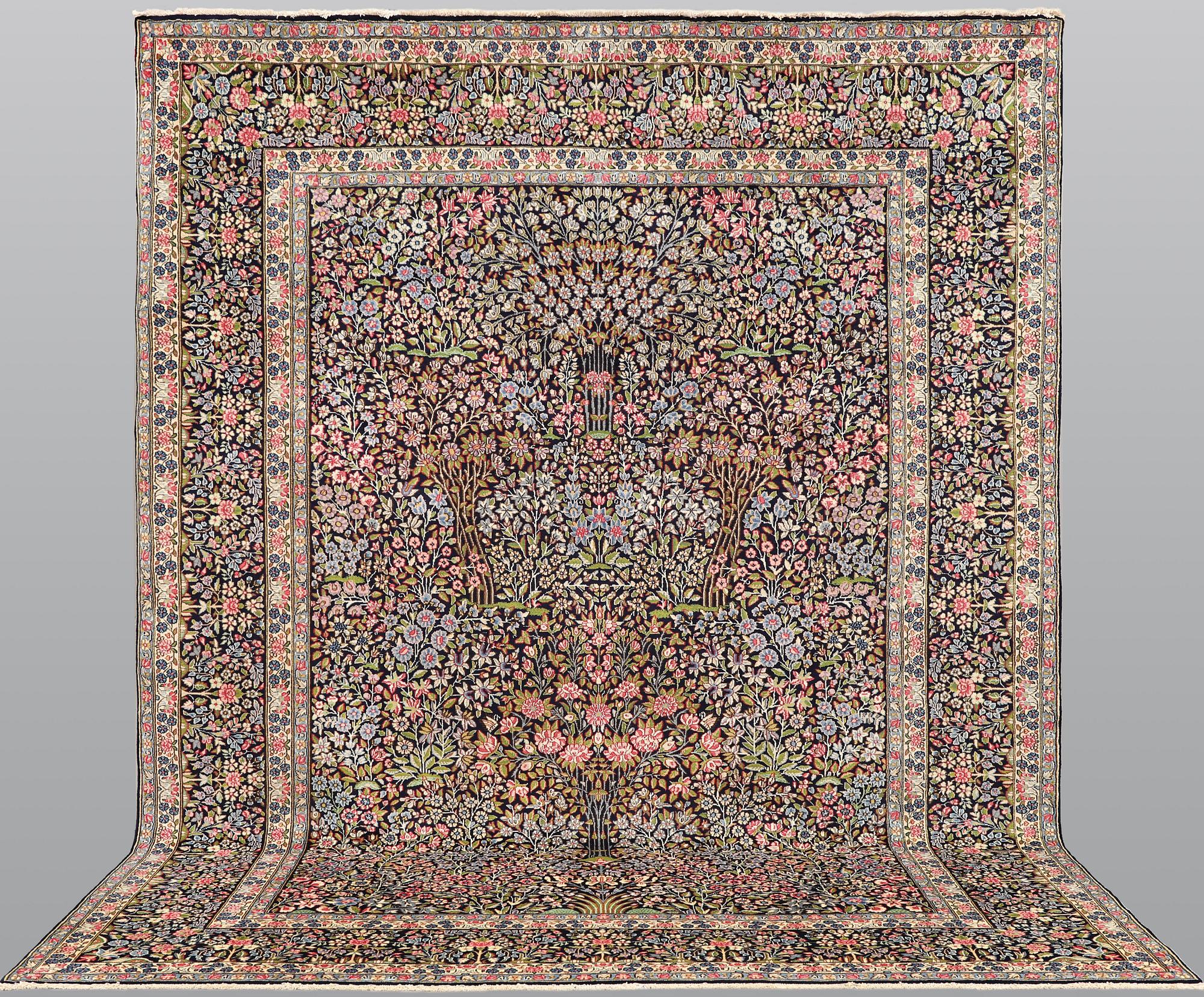 A Kerman Laver carpet, 'Millefleur', approx. 388 x 300 cm.