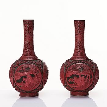 A pair of red lacquer vases, Qing dynasty (1644-1912).