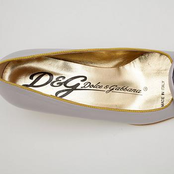 DOLCE & GABBANA, a pair of light purple leather pumps.