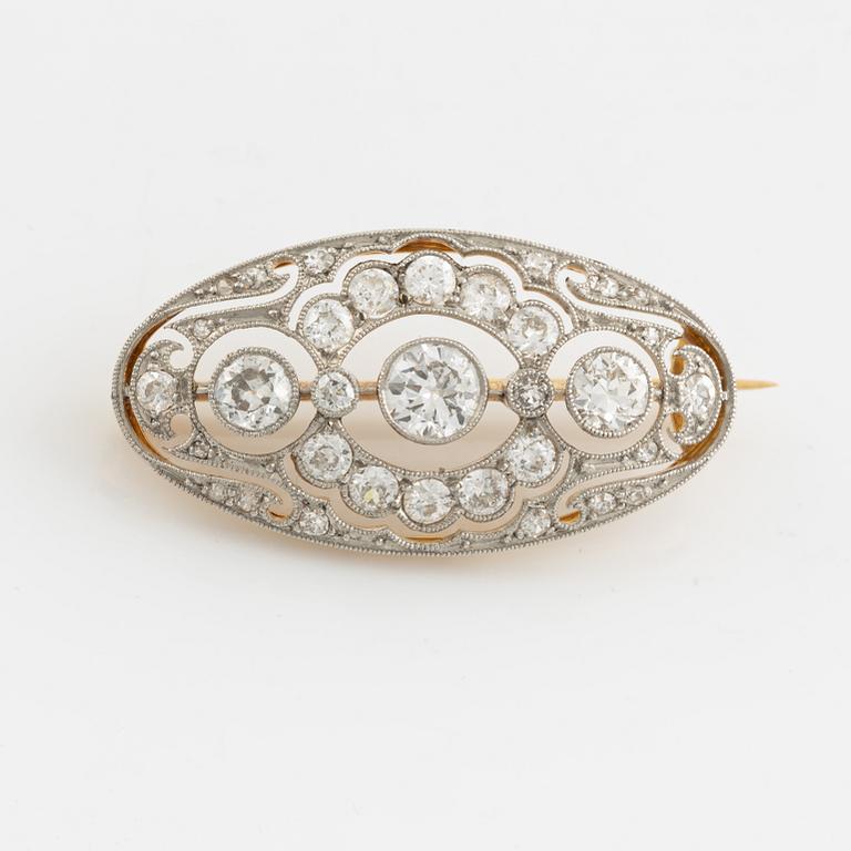 Gold and platinum and old cut diamond brooch.