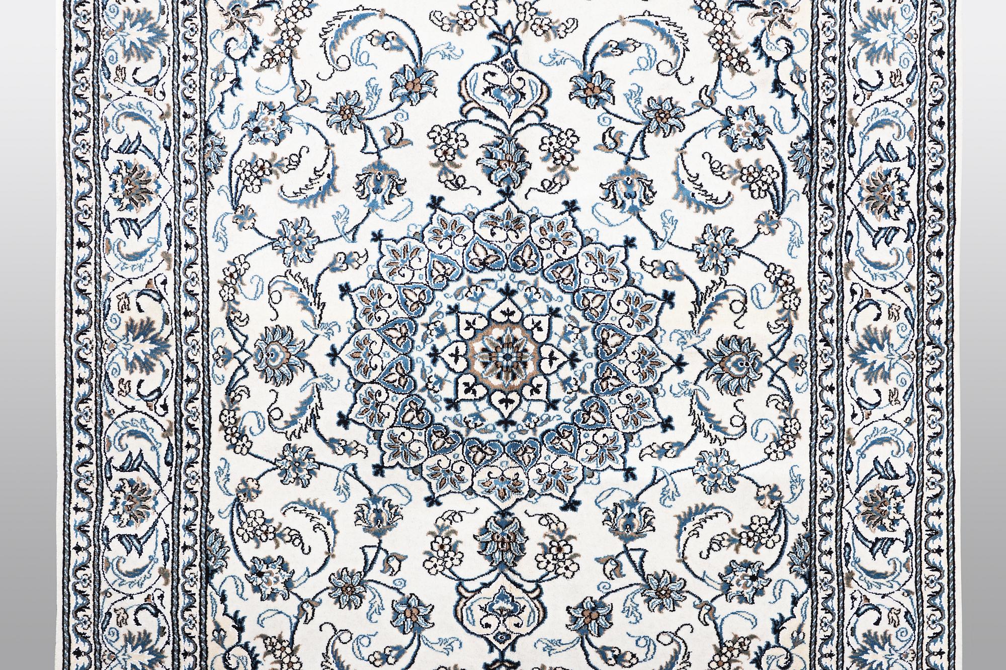 A carpet, Nain, 285 x 196 cm.