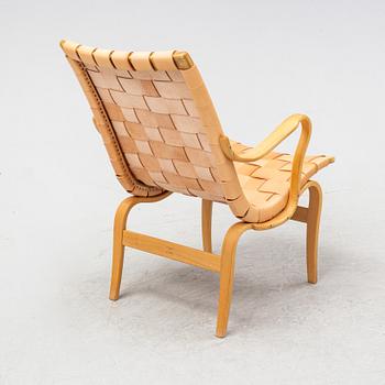 An 'Eva' easy chair by Bruno Mathsson for Firma Karl Mathsson dated 1971.