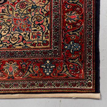 A rug, semi-antique Kashan/Sarouk, ca 199 x 134 cm.