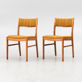 A dining table and four chairs, second half of the 20th century.