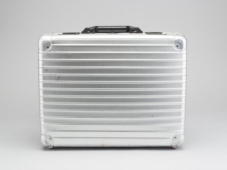 A set of three Rimowa bags later part of the 20th century.